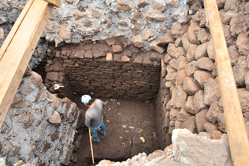 An INAH team member inspects the ancient temple.
